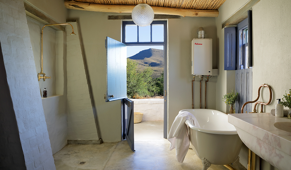 Bathrooms at De Kruis have stable doors opening to the garden. Perfect Hideaways, De Kruis, Tankwa Karoo, Northern Cape, South Africa. Photo: Henrique Wilding