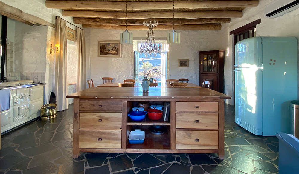 De Kruis farmhouse kitchen with Art Deco lights and chandelier. Perfect Hideaways, De Kruis, Tankwa Karoo, Northern Cape, South Africa. Photo: Henrique Wilding