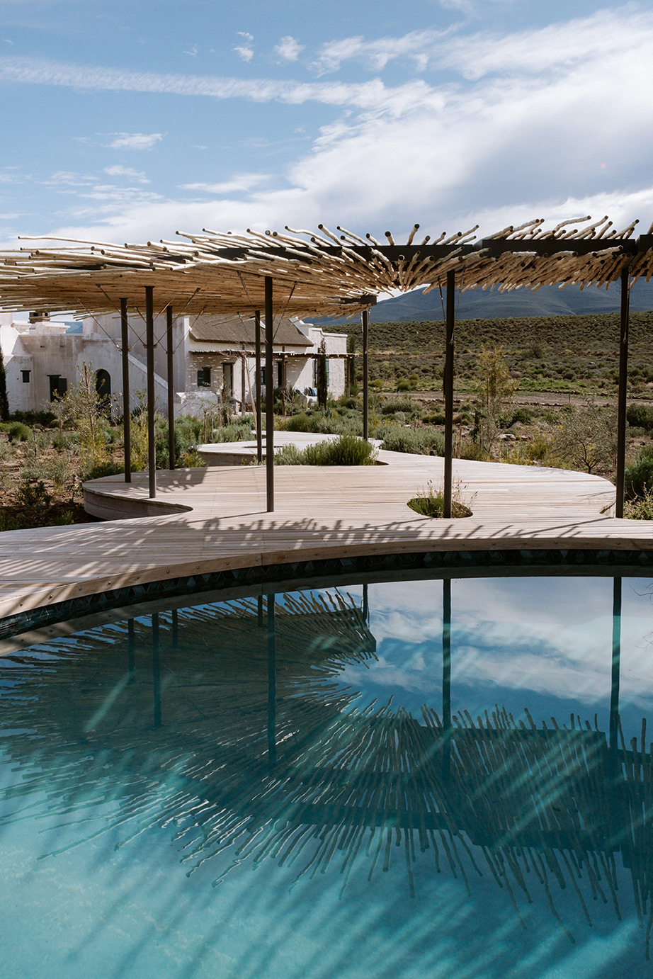 Reservoir-style swimming pool with latte roof. Perfect Hideaways, De Kruis, Tankwa Karoo, Northern Cape, South Africa.