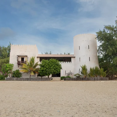 The Fort stands as an exquisite and stoic tribute to classic Omani architecture with white washed walls and a tropical garden positioned on an extensive white sand beach front.