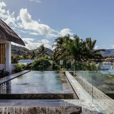 Elevated swimming pool with marble edges overlooking the Black River estuary.