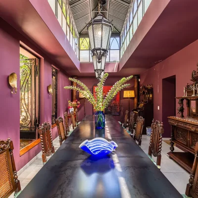 Old world Victorian dining area with grand skylight. House Nouveau.