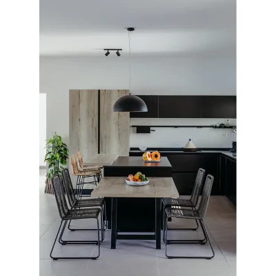 Modern kitchen with central island, and light wooden and charcoal finishes that reflect in the cabinets, counters, flooring and bar stools. Black River Penthouse.