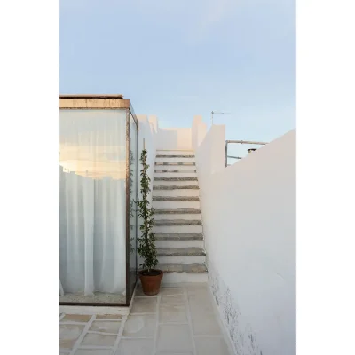 Casa Piana outdoor terrace with a corner stone staircase.